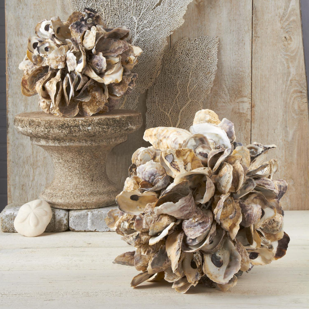 oyster shell ball in 2 assorted sizes design by twos company 2