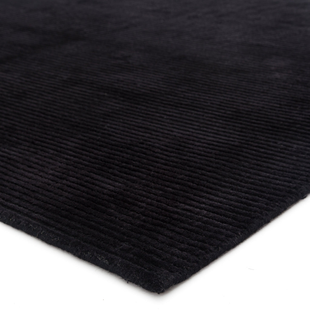 basis solid rug in jet black design by jaipur 2