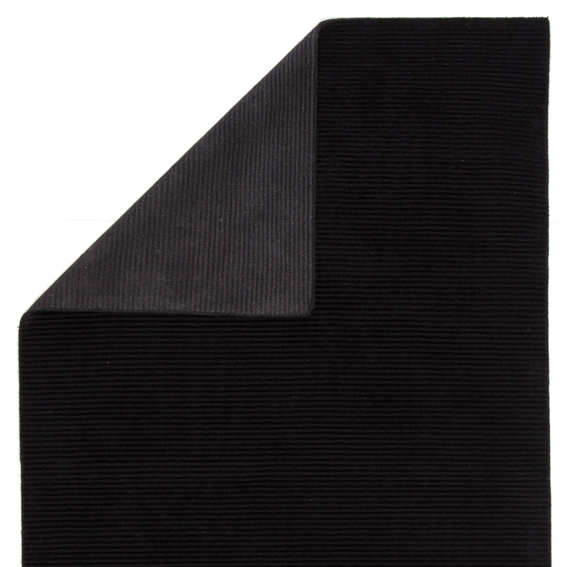 basis solid rug in jet black design by jaipur 3