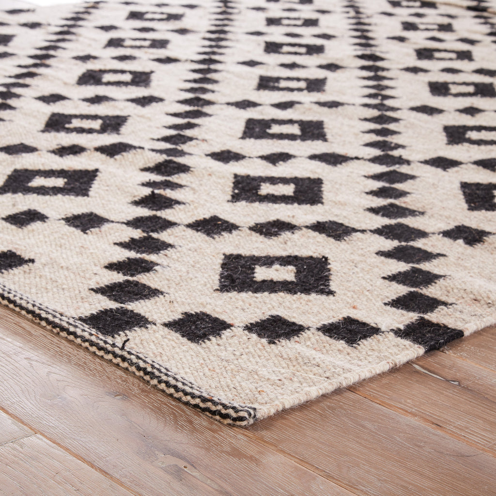 croix geometric rug in turtledove jet black design by jaipur 2