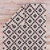 croix geometric rug in turtledove jet black design by jaipur 3