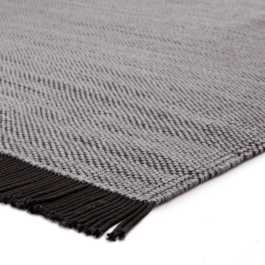 savvy handmade indoor outdoor solid gray black area rug by jaipur living 2