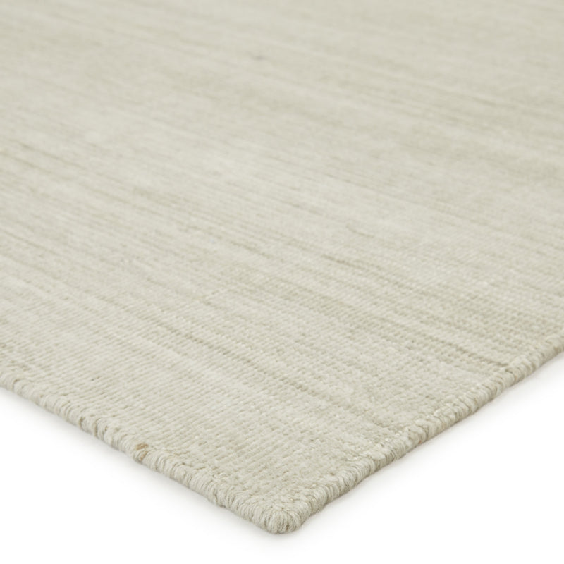 danan handmade solid ivory light gray rug by jaipur living 3