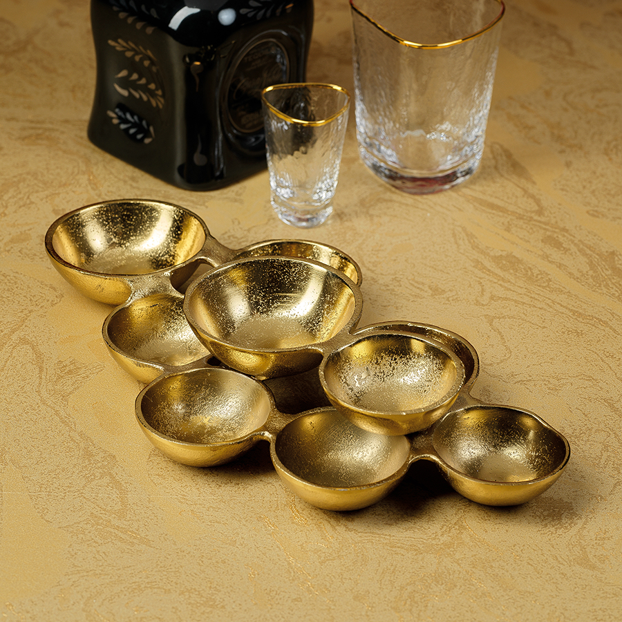 small cluster of nine serving bowls dark gold 2