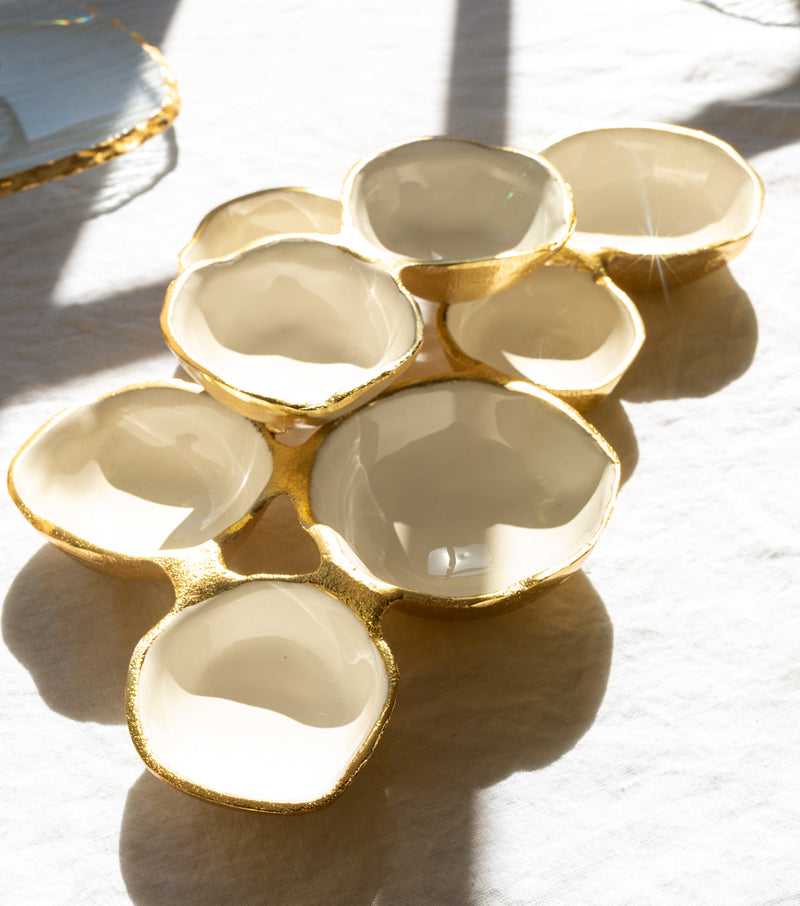 small cluster of eight serving bowls gold and white 4