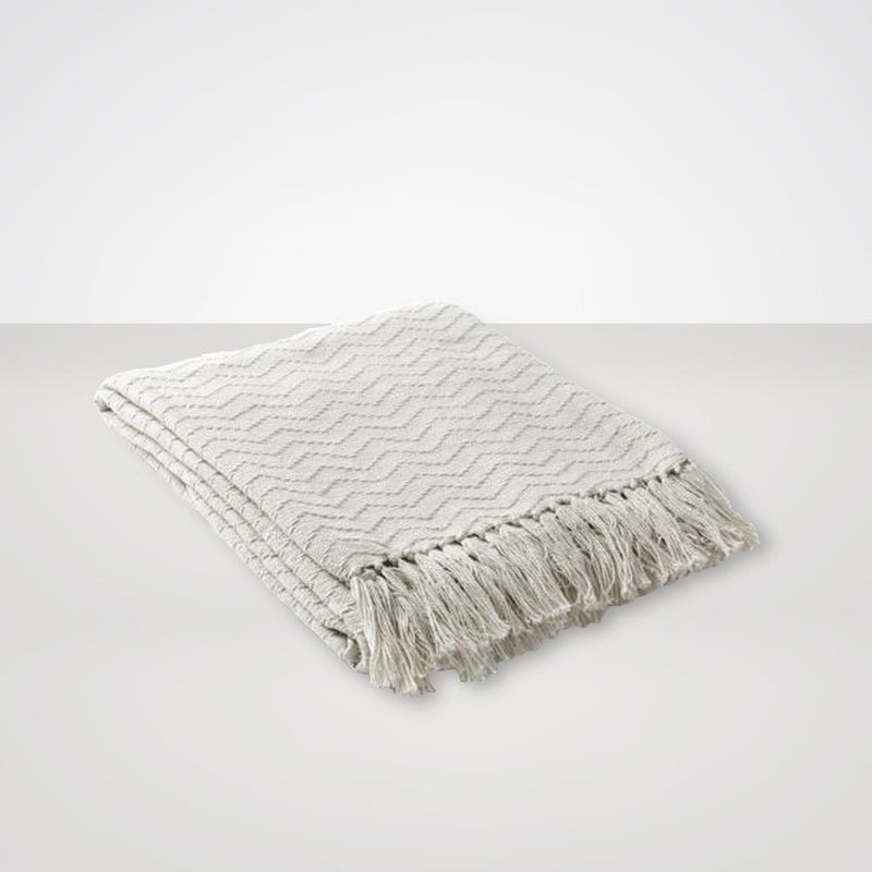 Thelma Throw Blankets in Cream Color